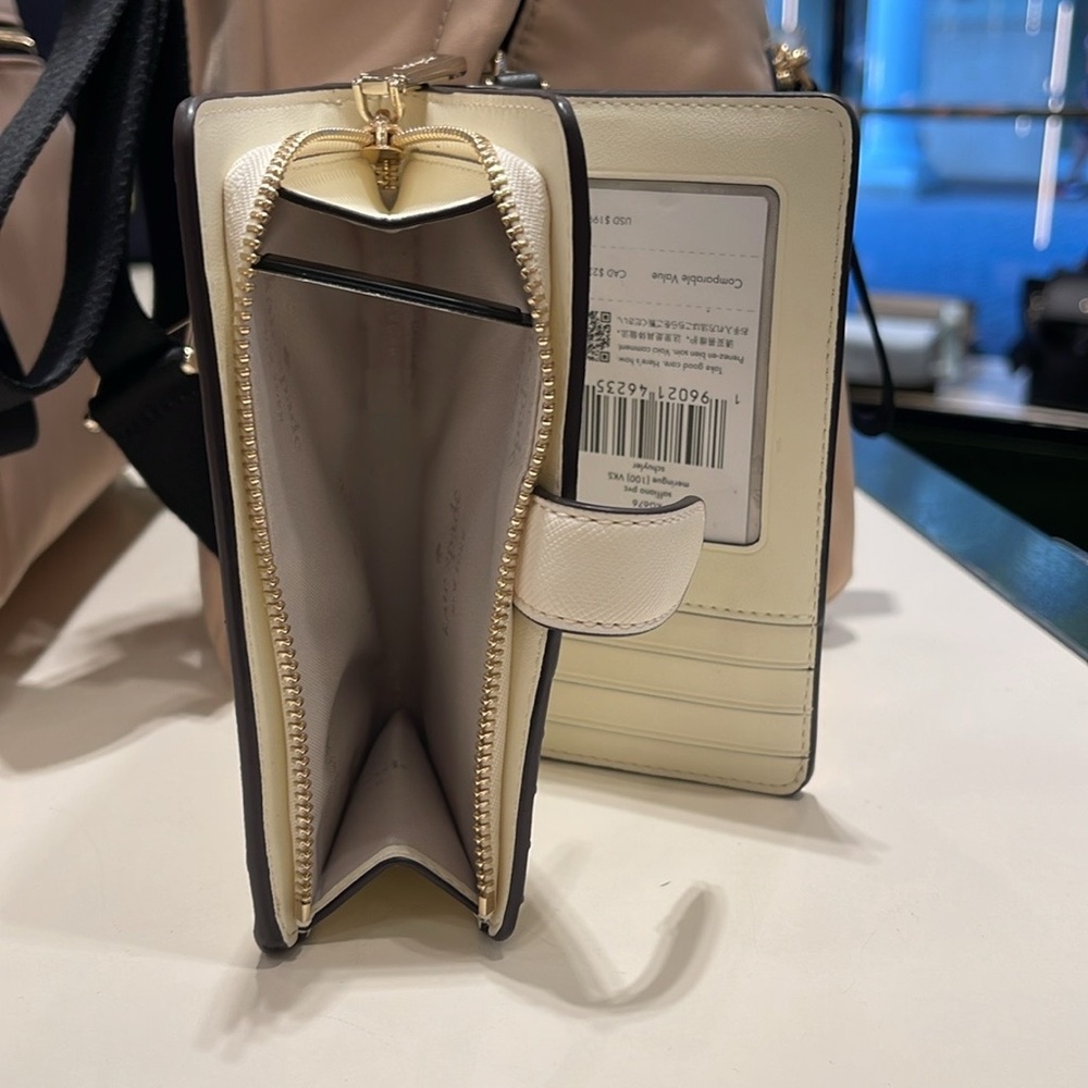 Kate Spade Schuyler Medium Compact Bifold Wallet
Meringue 
NWT - Picture 8 of 16